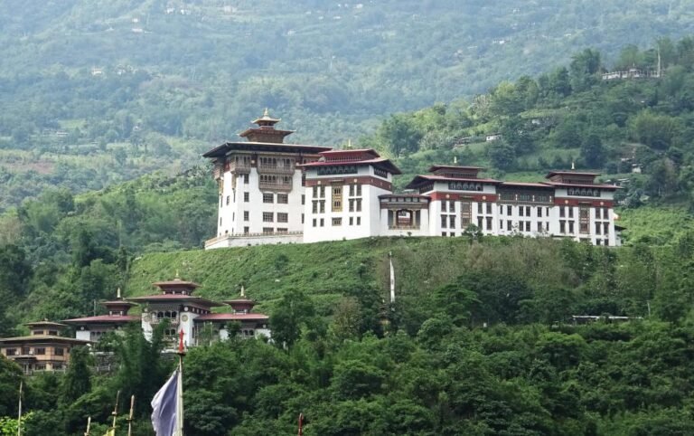 Pemagatshel Dzong above a forested valley, Bhutan